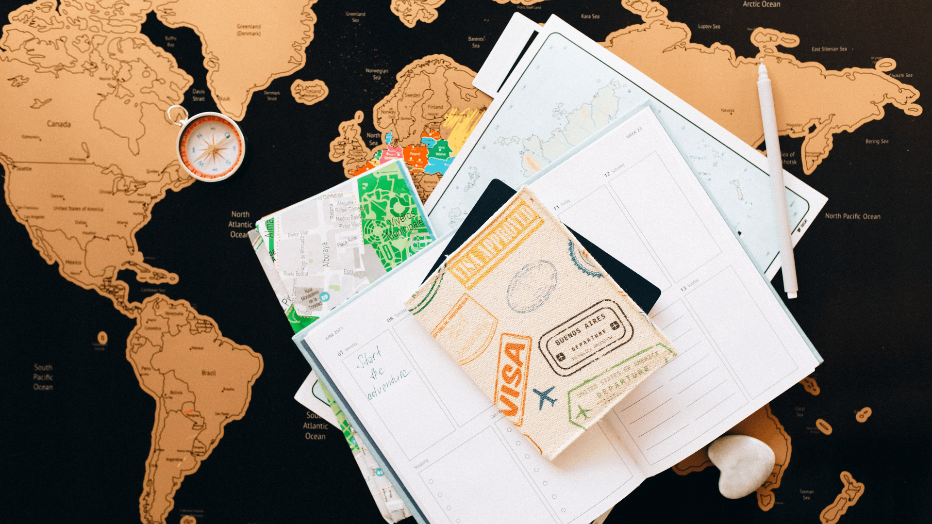 World map with notes and travel documents